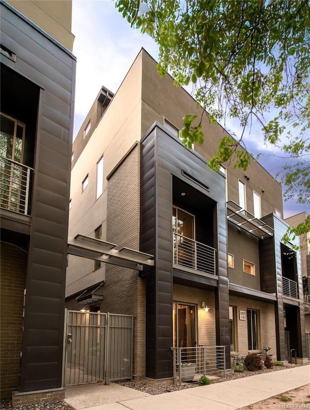 1333 Elati St Unit 1, Denver, CO 80204 - exterior space featuring brick siding