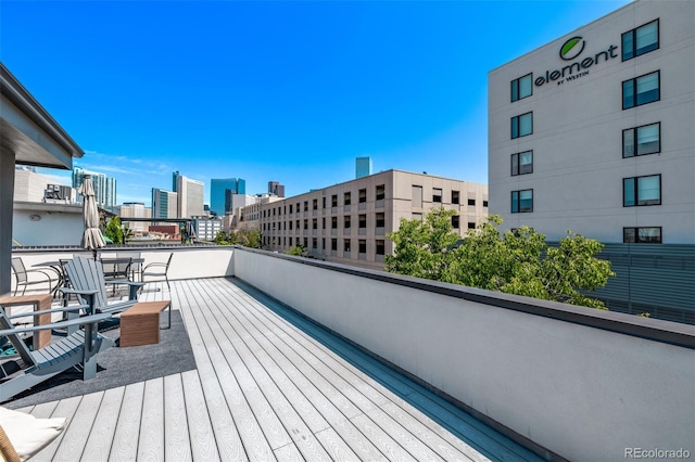 1333 Elati St Unit 1, Denver, CO 80204 - wooden terrace featuring a city view