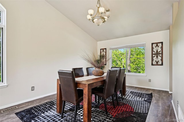 5465 Broadmoor Bliff Dr, Colorado Springs, CO 80904 - dining space featuring a chandelier, dark wood-style flooring, baseboards, and vaulted ceiling