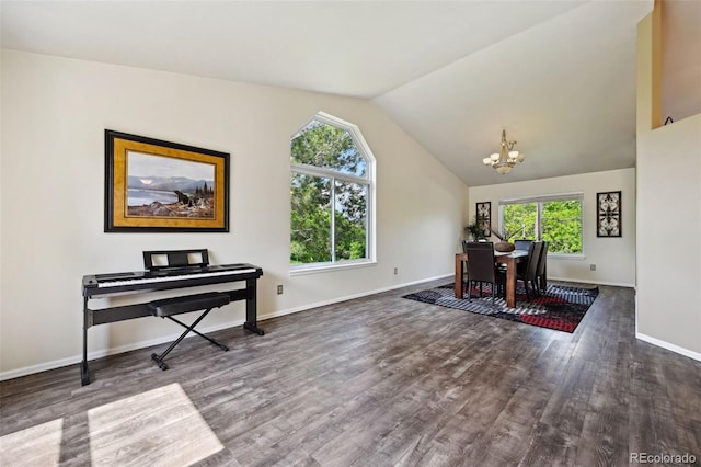 5465 Broadmoor Bliff Dr, Colorado Springs, CO 80904 - office area with a chandelier, wood finished floors, healthy amount of natural light, and vaulted ceiling