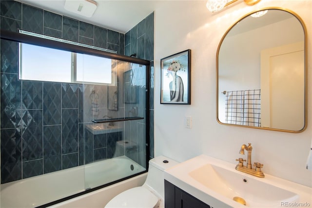 full bathroom with vanity, toilet, and combined bath / shower with glass door