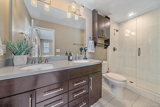 21392 E Stroll Ave, Parker, CO 80138 - full bath with double vanity, a shower stall, and tile patterned flooring