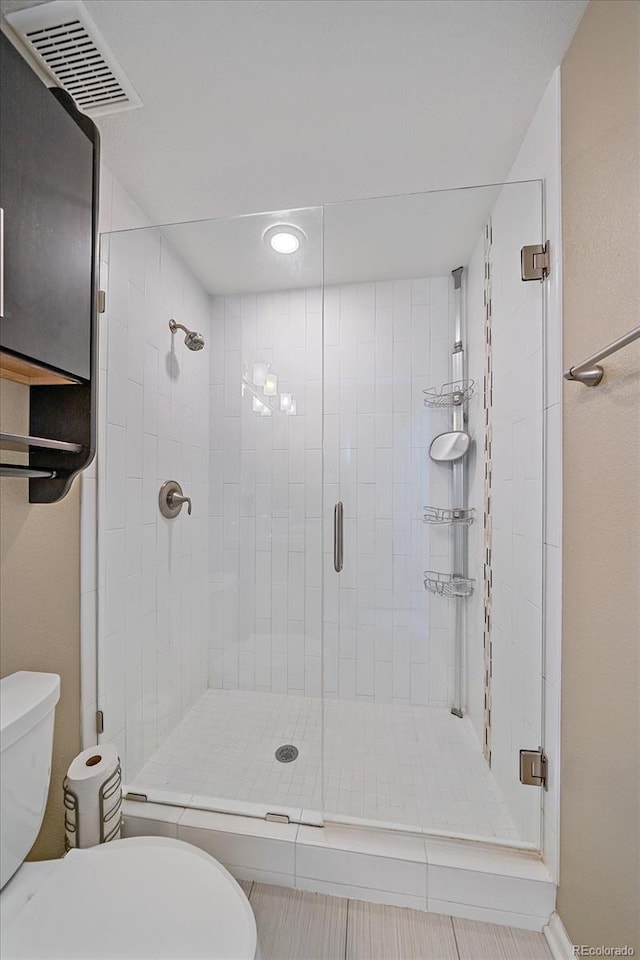 21392 E Stroll Ave, Parker, CO 80138 - full bathroom featuring a stall shower and recessed lighting