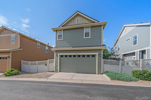 21392 E Stroll Ave, Parker, CO 80138 - view of front of home featuring board and batten siding and a garage