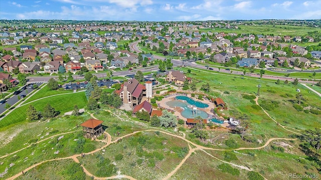 21392 E Stroll Ave, Parker, CO 80138 - aerial view of property and surrounding area with a pool and nearby suburban area