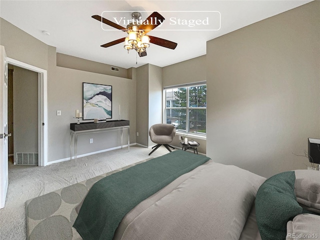 carpeted bedroom with ceiling fan