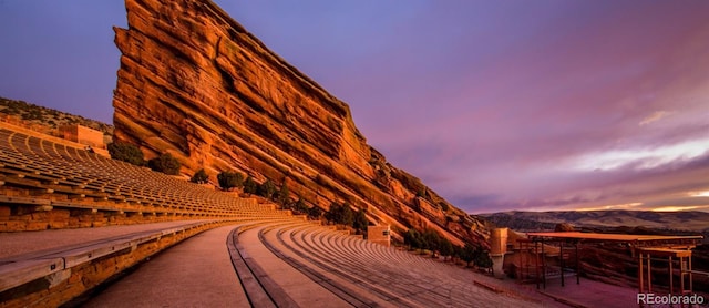 outdoor building at dusk featuring a mountain view