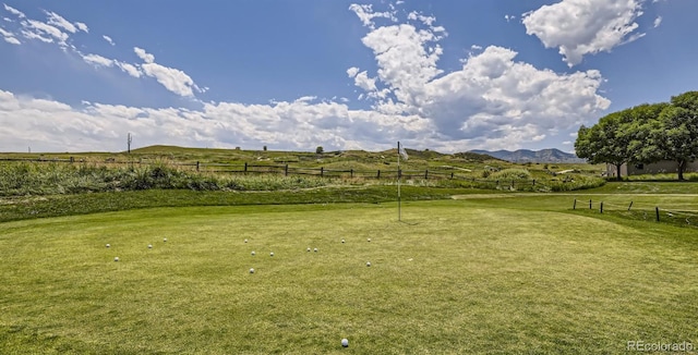 view of yard featuring a mountain view and a rural view