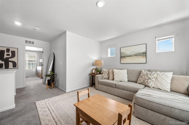 4060 N Rome St, Aurora, CO 80019 - living room with baseboards, light colored carpet, and recessed lighting