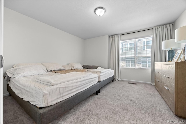 4060 N Rome St, Aurora, CO 80019 - bedroom with baseboards and light colored carpet