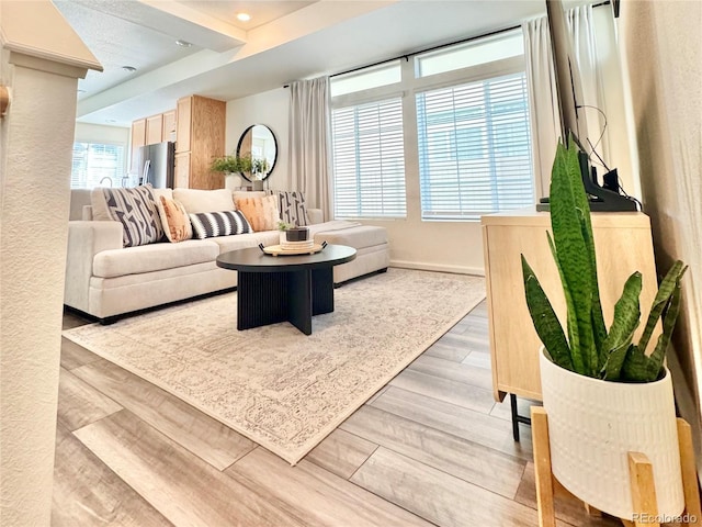 4060 N Rome St, Aurora, CO 80019 - living room featuring light wood-style floors and recessed lighting