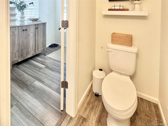 4060 N Rome St, Aurora, CO 80019 - half bath with toilet and wood finished floors