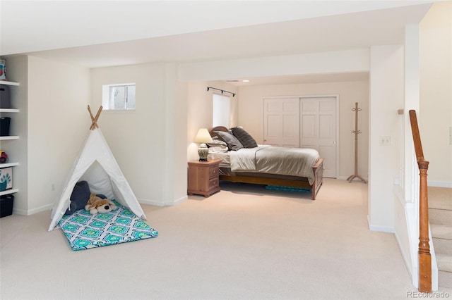 2345 Spotswood Pl, Boulder, CO 80304 - bedroom featuring light colored carpet, a closet, and baseboards