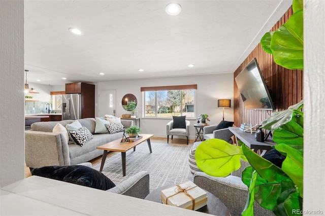 living area featuring recessed lighting and light wood-type flooring