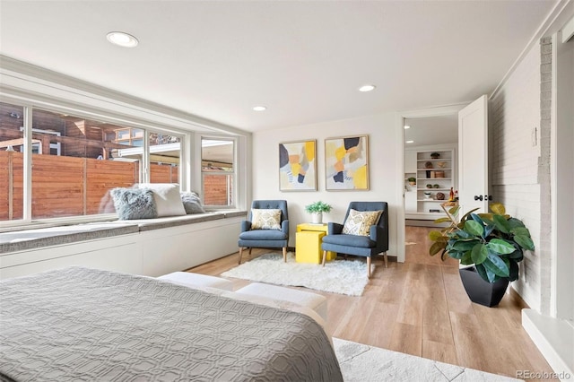 bedroom featuring recessed lighting and light wood-style floors