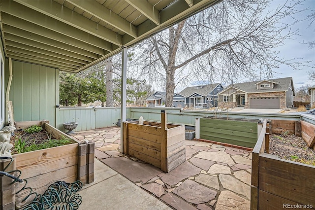 view of patio / terrace with a residential view