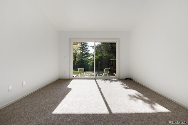8543 Redstone St, Highlands Ranch, CO 80126 - carpeted spare room featuring baseboards
