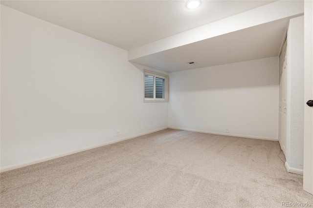 8543 Redstone St, Highlands Ranch, CO 80126 - carpeted empty room featuring baseboards