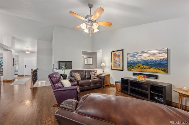 living room with ceiling fan and wood-type flooring