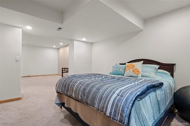 carpeted bedroom with recessed lighting, visible vents, and baseboards