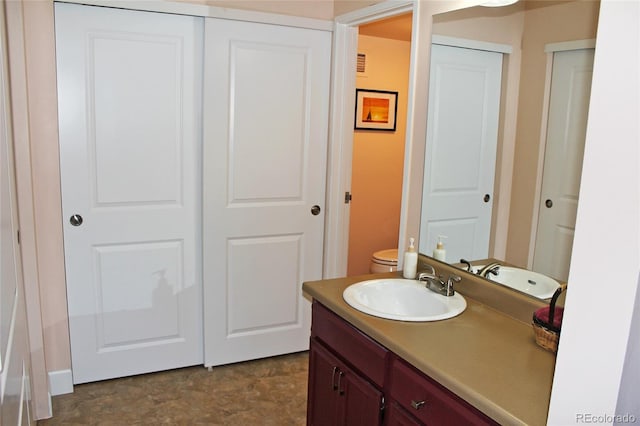 bathroom featuring visible vents and vanity