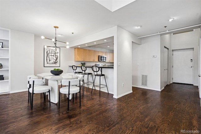 dining room featuring recessed lighting, visible vents, dark wood finished floors, and baseboards