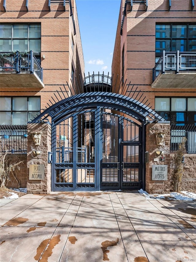 view of gate featuring fence