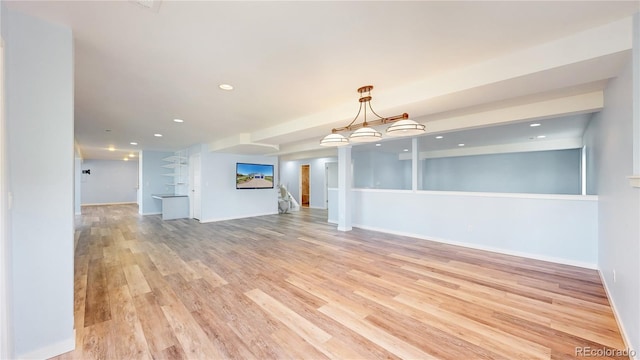 14701 Yosemite St, Brighton, CO 80602 - unfurnished living room with light wood-style floors, recessed lighting, and baseboards