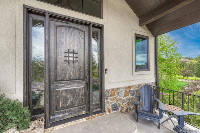 5428 Forest View Rd, Parker, CO 80134 - entrance to property featuring stone siding and stucco siding