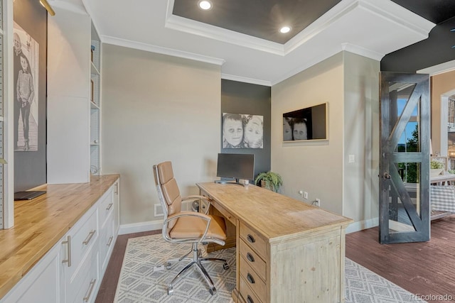 5428 Forest View Rd, Parker, CO 80134 - home office featuring wood finished floors, baseboards, crown molding, recessed lighting, and a raised ceiling