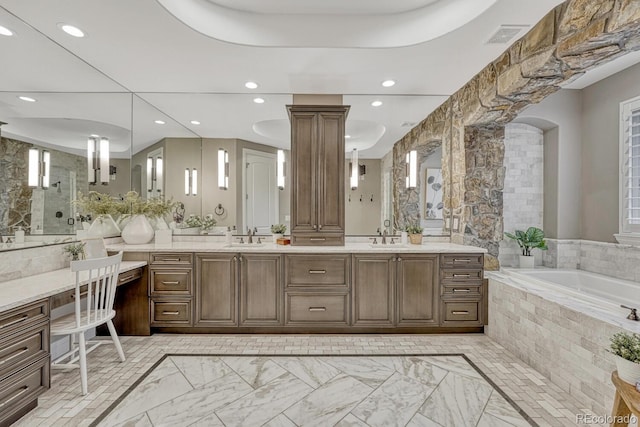 5428 Forest View Rd, Parker, CO 80134 - full bathroom with a bath, double vanity, a stall shower, decorative columns, and recessed lighting