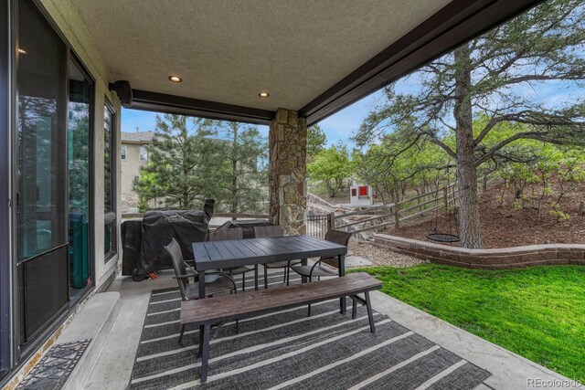 5428 Forest View Rd, Parker, CO 80134 - view of patio / terrace with outdoor dining area