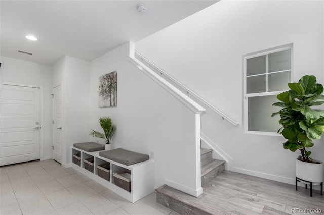 8958 Southurst St, Littleton, CO 80129 - entrance foyer with stairway, baseboards, and recessed lighting