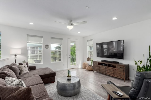 8958 Southurst St, Littleton, CO 80129 - living room featuring wood finished floors, ceiling fan, recessed lighting, and baseboards