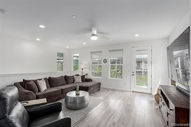 8958 Southurst St, Littleton, CO 80129 - living room with light wood finished floors, a ceiling fan, recessed lighting, and baseboards