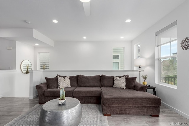 8958 Southurst St, Littleton, CO 80129 - living area with recessed lighting, wood finished floors, baseboards, and a ceiling fan