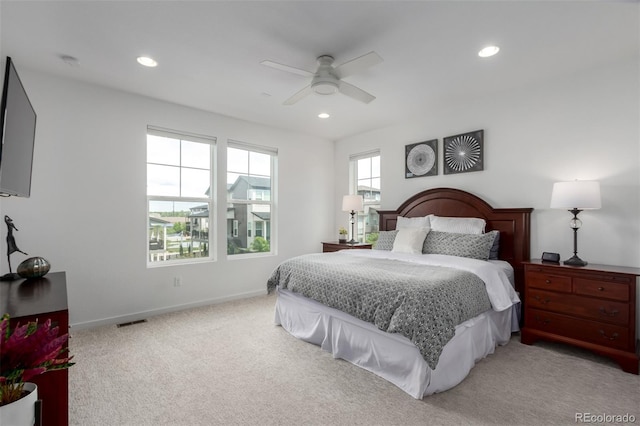 8958 Southurst St, Littleton, CO 80129 - bedroom with light carpet, recessed lighting, baseboards, and ceiling fan