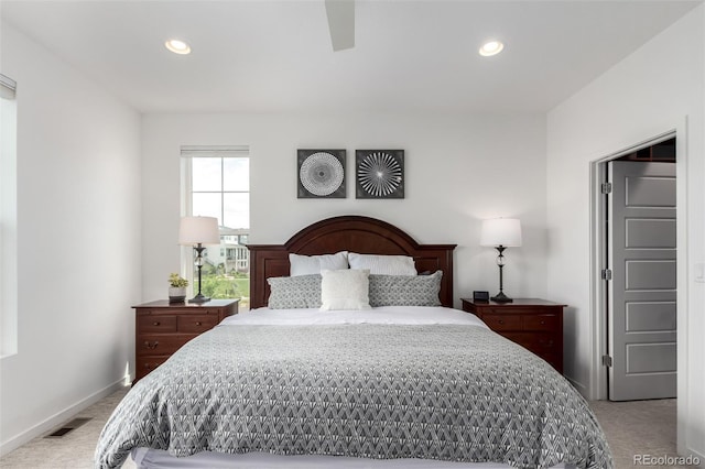 8958 Southurst St, Littleton, CO 80129 - bedroom with light carpet, recessed lighting, and baseboards