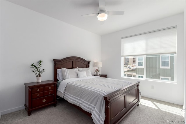 8958 Southurst St, Littleton, CO 80129 - bedroom featuring light colored carpet, baseboards, and ceiling fan