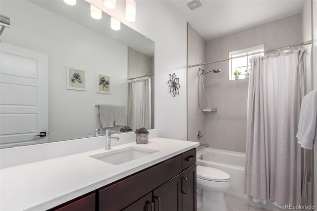 8958 Southurst St, Littleton, CO 80129 - full bathroom featuring shower / bathtub combination with curtain, vanity, and toilet
