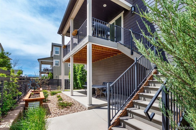 8958 Southurst St, Littleton, CO 80129 - view of patio with stairway and fence