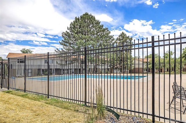 pool featuring fence