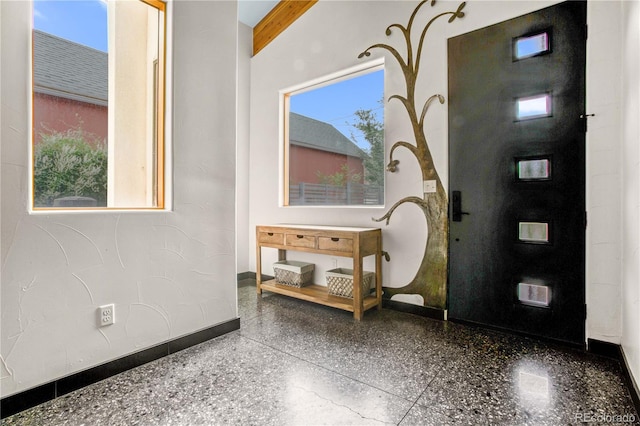 bathroom with beam ceiling