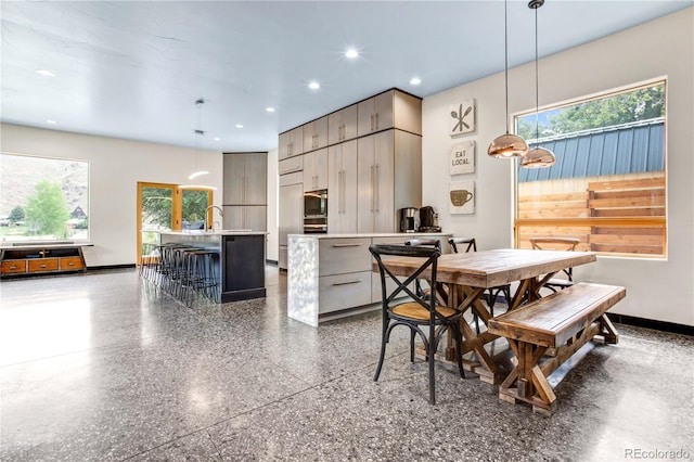 dining space featuring plenty of natural light