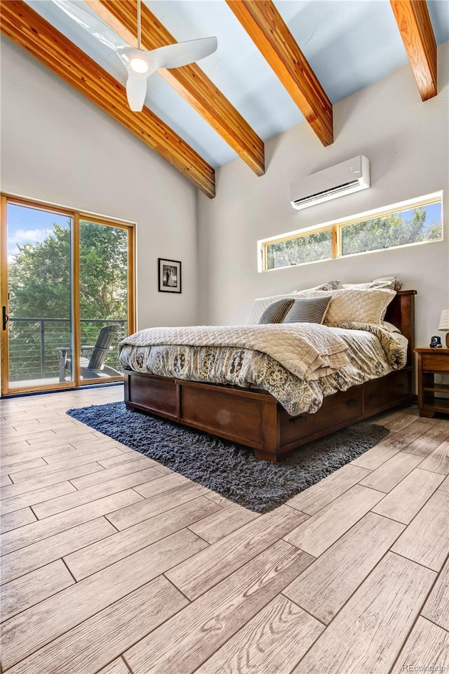 bedroom with light wood-type flooring, access to outside, ceiling fan, beam ceiling, and an AC wall unit