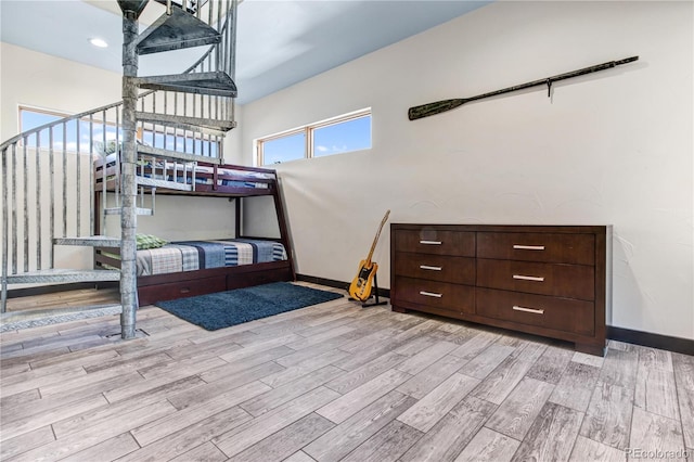 bedroom featuring light wood-type flooring