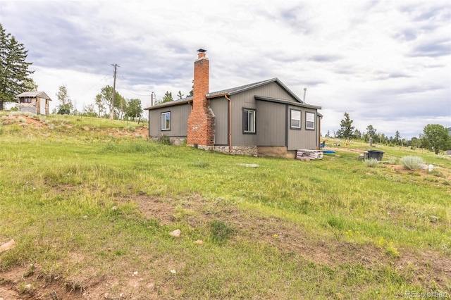2947 County Road 86, Victor, CO 80860 - exterior space featuring a chimney