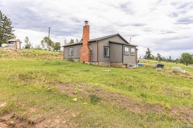 exterior space featuring a chimney