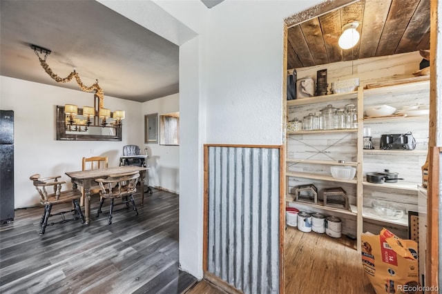 dining area with wood finished floors