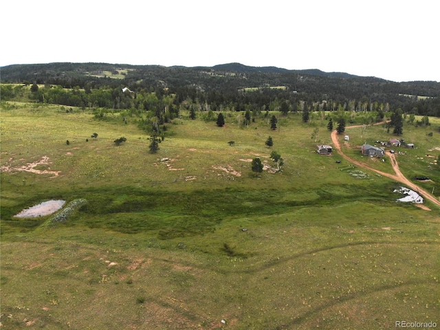 bird's eye view with a rural view and a mountain view